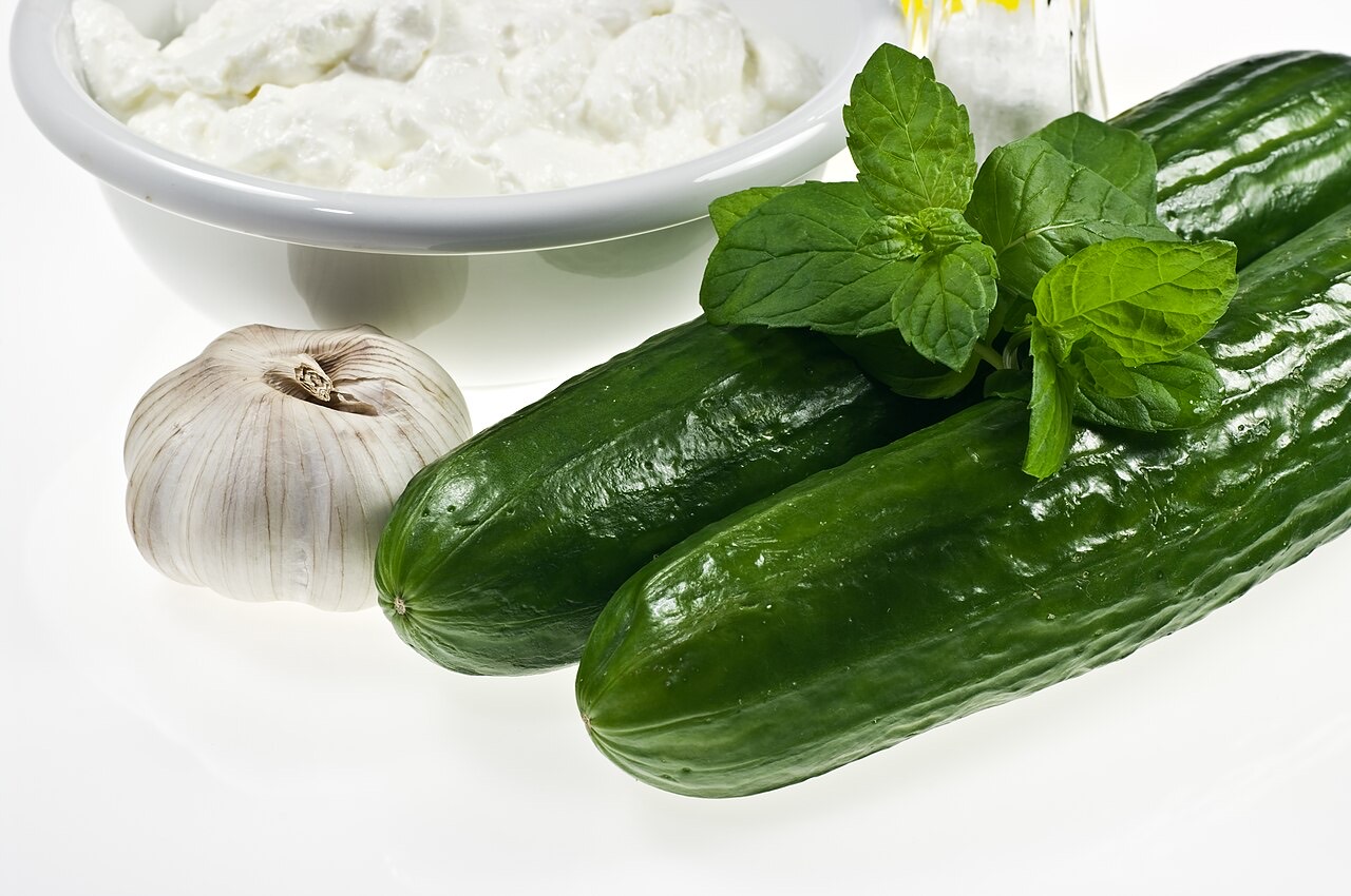 Cucumbers growing on the vine